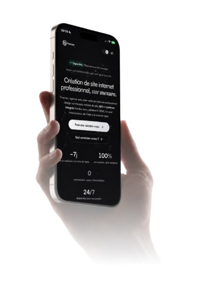 Le site Freezon affiche sur un iPhone, tenu en main